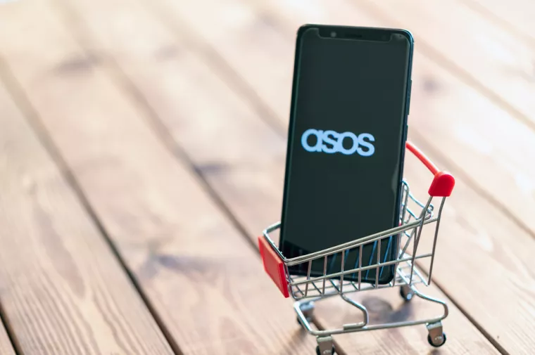 Tel Aviv, Israel. March 21, 2019. Smartphone with ASOS application on screen in shopping cart. Purchases through ASOS app concept.<br>ASOS online trgovina, shopping
