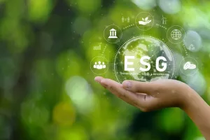 ESG icon concept. Environment in renewable hands. Nature, earth, society and governance SG in sustainable business on networked connections on green background. environmental icon<br>ESG