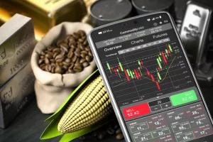 Smartphone and commodities. Stock exchange market trading platform on the screen of mobile phone. 3d illustration<br>burzovne robe, cijene roba, cijene burzovnih roba, tržišta, kava, kukuruz, cijena