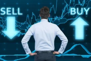 businessman looking to graph on virtual touchscreen