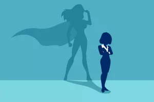 Vector of a strong business woman with a shadow imagining to be a super hero looking aspired.<br>žena, samopouzdanje, samopoštovanje, žene u biznisu
