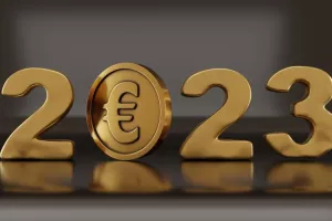 0-3d rendering of the euro gold coin and the date of the 2023 new year in gold. The idea of prosperity and wealth, success and abundance in the new year 2023. 3d illustration for financial calendars.