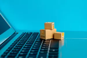 Small cartons on laptop keyboard.