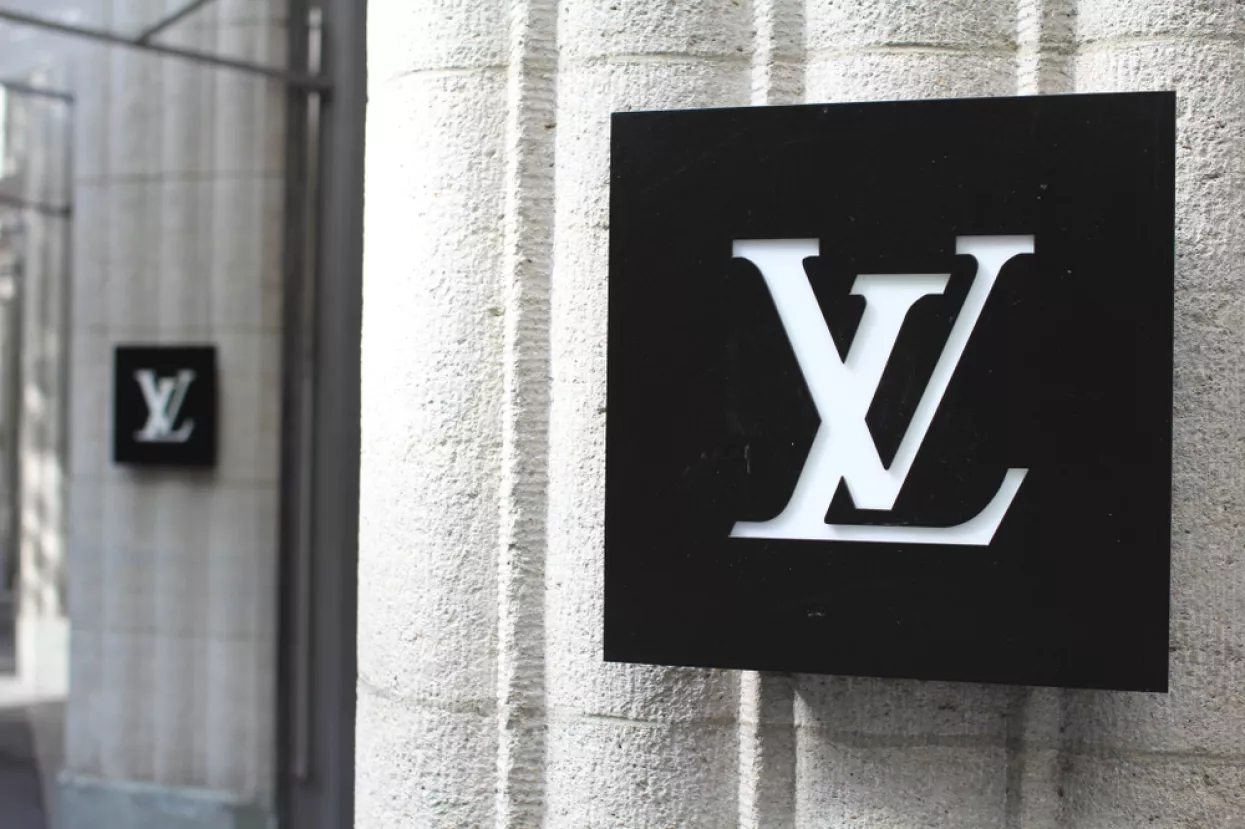ZURICH, SWITERLAND - June 21, 2015The monogram for Louis Vuitton Malletier, commonly known as Louis Vuitton, or shortened to LV, a fashion house and luxury retail company outside a boutique store.