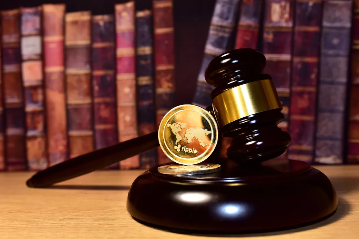 Judge hammer and XRP crypto coin. Justice courtroom. Ripple demands Bitcoin and Ethereum docs from SEC amid legal fight. Delist Ñ�ryptocurrency trading. Exchanges and traders. law to ban blockchainripple SEC
