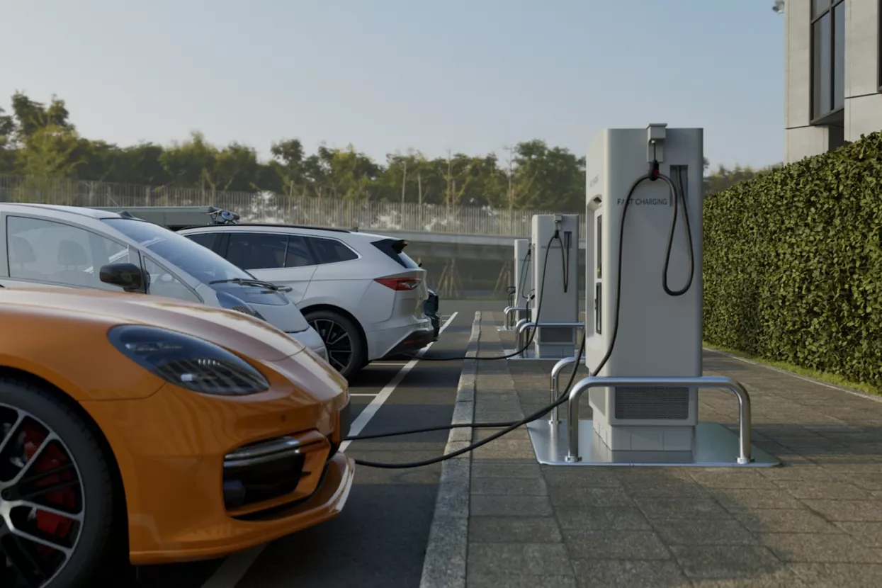 Generic electric car charging at station dock point in parking lot near shopping or office building. City street power hub providing eco-friendly sustainable supply for EV vehicle