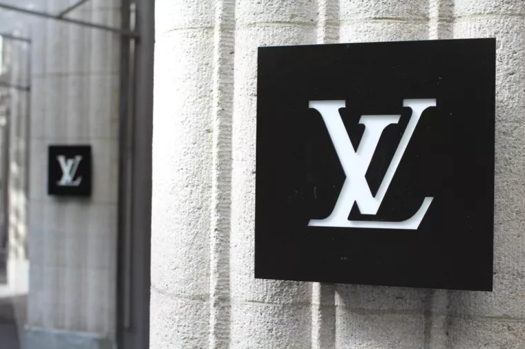 ZURICH, SWITERLAND - June 21, 2015The monogram for Louis Vuitton Malletier, commonly known as Louis Vuitton, or shortened to LV, a fashion house and luxury retail company outside a boutique store.