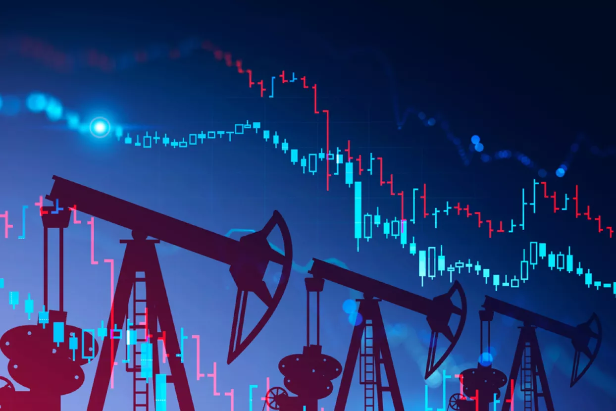 Three oil pumps over blue background with double exposure of falling blurry digital graphs. Concept of oil market crisis. 3d rendering toned imagenafta, plin, proizvodnja, pad proizvodnje, pad cijena, cijene, cijene nafte, cijene plina, burze, burzovne robe, energenti