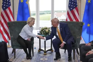 President Donald Trump shakes hands with European Commission President Ursula von der Leyen as they meet at the Trump Turnberry golf course in Turnberry, Scotland Sunday, July 27, 2025. (AP Photo/Jacquelyn Martin)