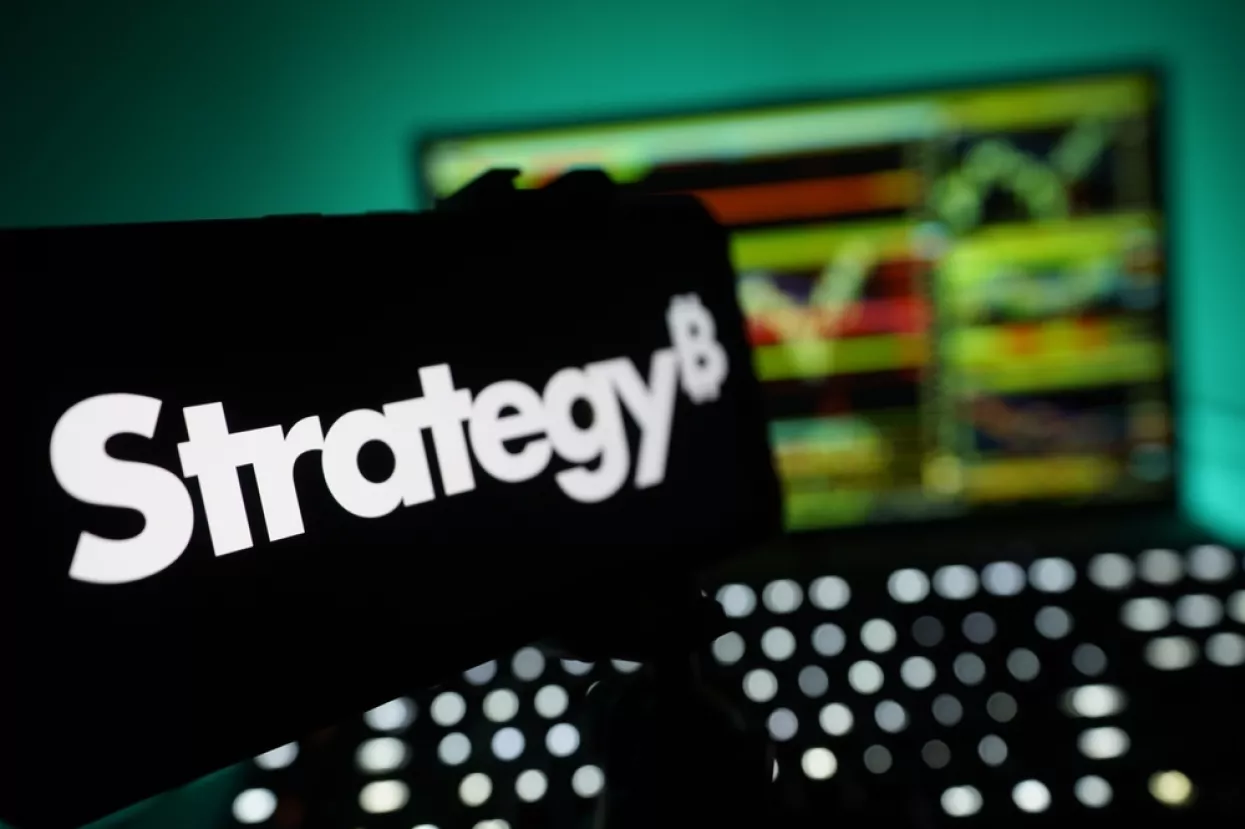 Los Angeles, California - July 11 2025MicroStrategy Logo On Mobile And Computer Screens With Stock Chart Background