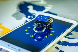 Padlock over a smartphone and EU map, symbolizing the EU General Data Protection Regulation or GDPR. Designed to harmonize data privacy laws across Europe.