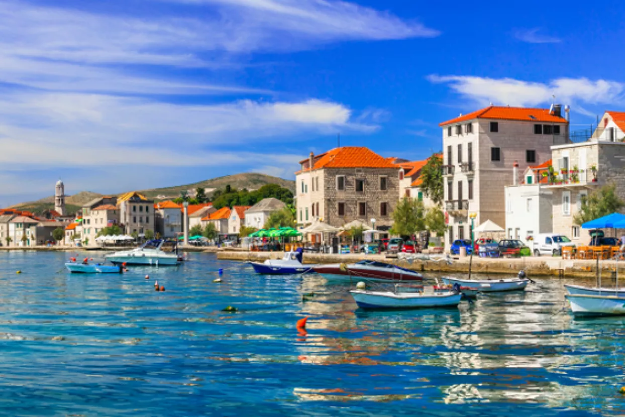 Travel in Croatia. Traditional coastal village Ka&scaron;tela, Ka&scaron;tel Stari with colorful fishing boats, Central Dalmatia