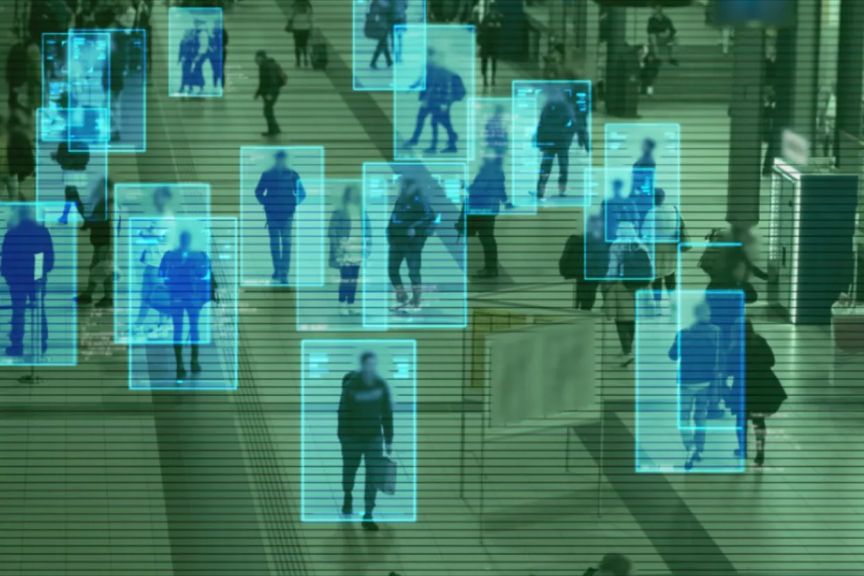 Scanning the crowd of people walking at the railway station. Surveillance interface using artificial intelligence and facial recognition. Face Detection, CCTV, AI, Future, Total Control, Privacy..