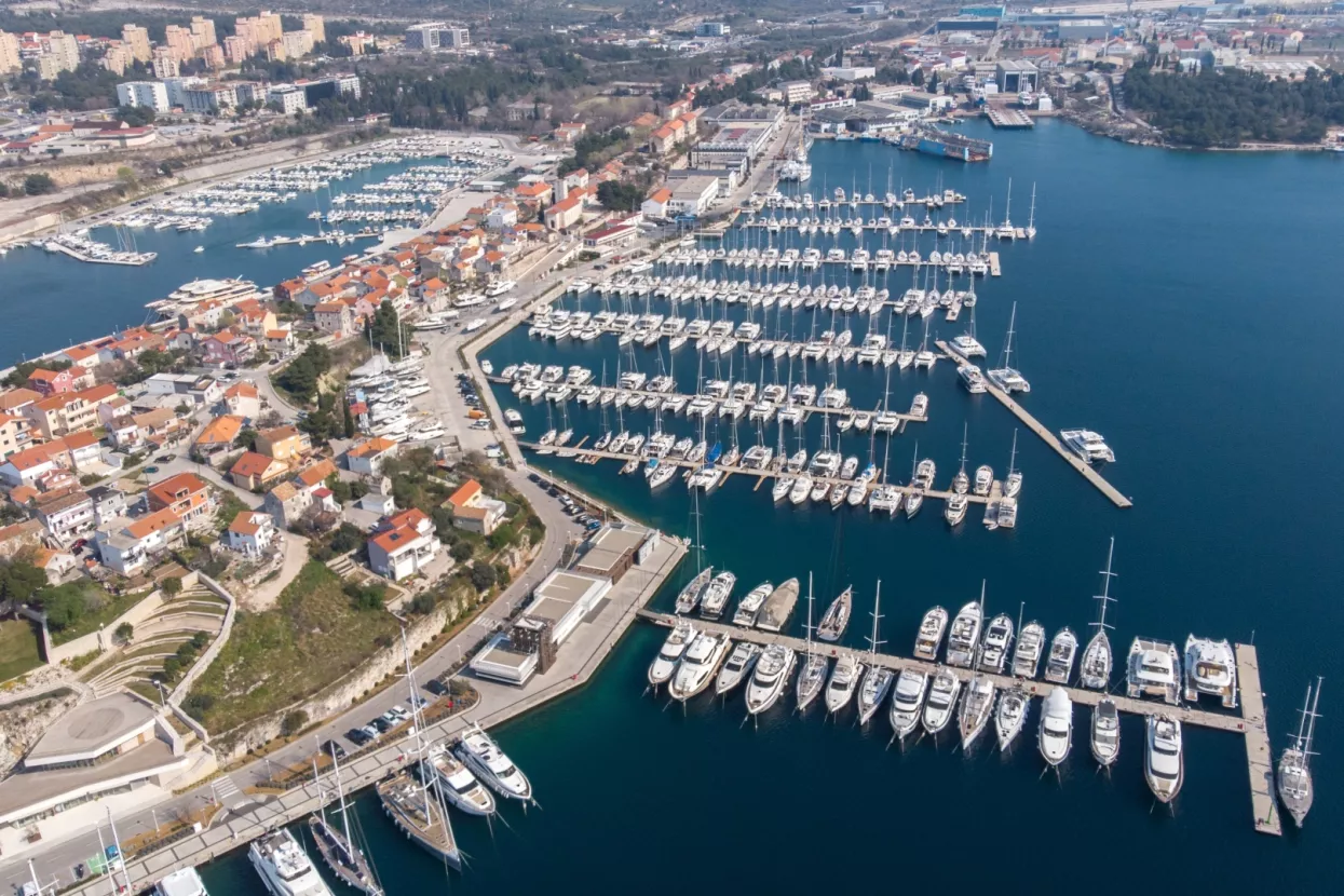 Aerial photography of beautiful D-Marin Marina Mandalina in Sibenik, main marina in the town. Modern port for sailing yachts, catamarans and motor yachts